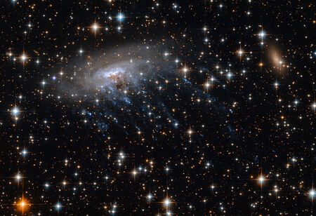 Þyrilþokan ESO 137-001 á mynd Hubble geimsjónaukans