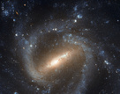 NGC 1073, bjálkaþyrilþoka