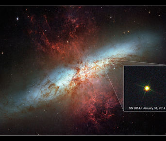 Mynd Hubble geimsjónaukans af sprengistjörnunni SN 2014J í Messier 82