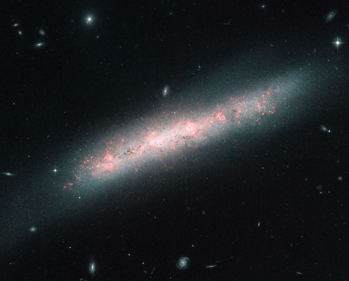 NGC 4700, Meyjan, Þyrilvetrarbraut, Bjálkaþyrilvetrarbraut