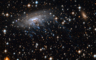 Þyrilþokan ESO 137-001 á mynd Hubble geimsjónaukans