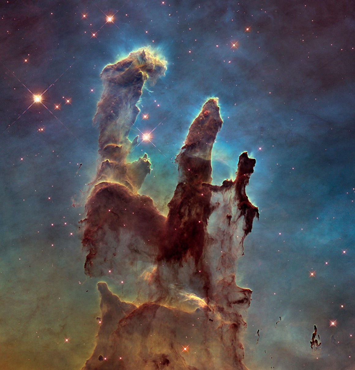 Stólpar sköpunarinnar í Arnarþokunni (Messier 16). Mynd: NASA/ESA og Hubble