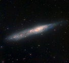 NGC 55, bjálkaþoka,